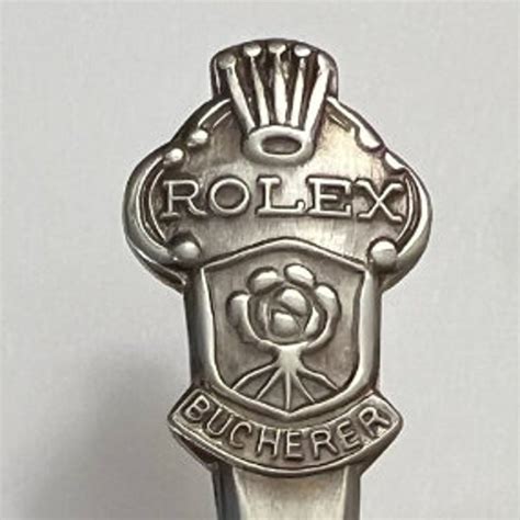 rolex lugano spoon.